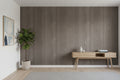 Close-up of a textured gray surface with a light wood panel on the right