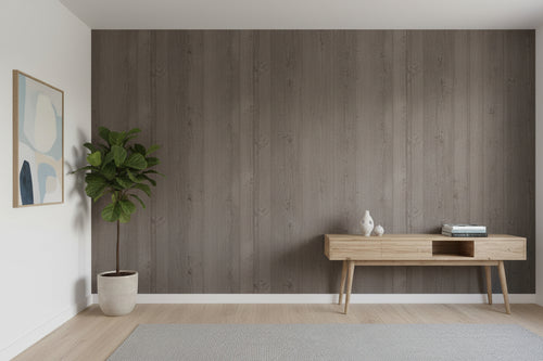Close-up of a textured gray surface with a light wood panel on the right