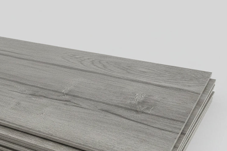 Stack of gray wooden planks on a white background